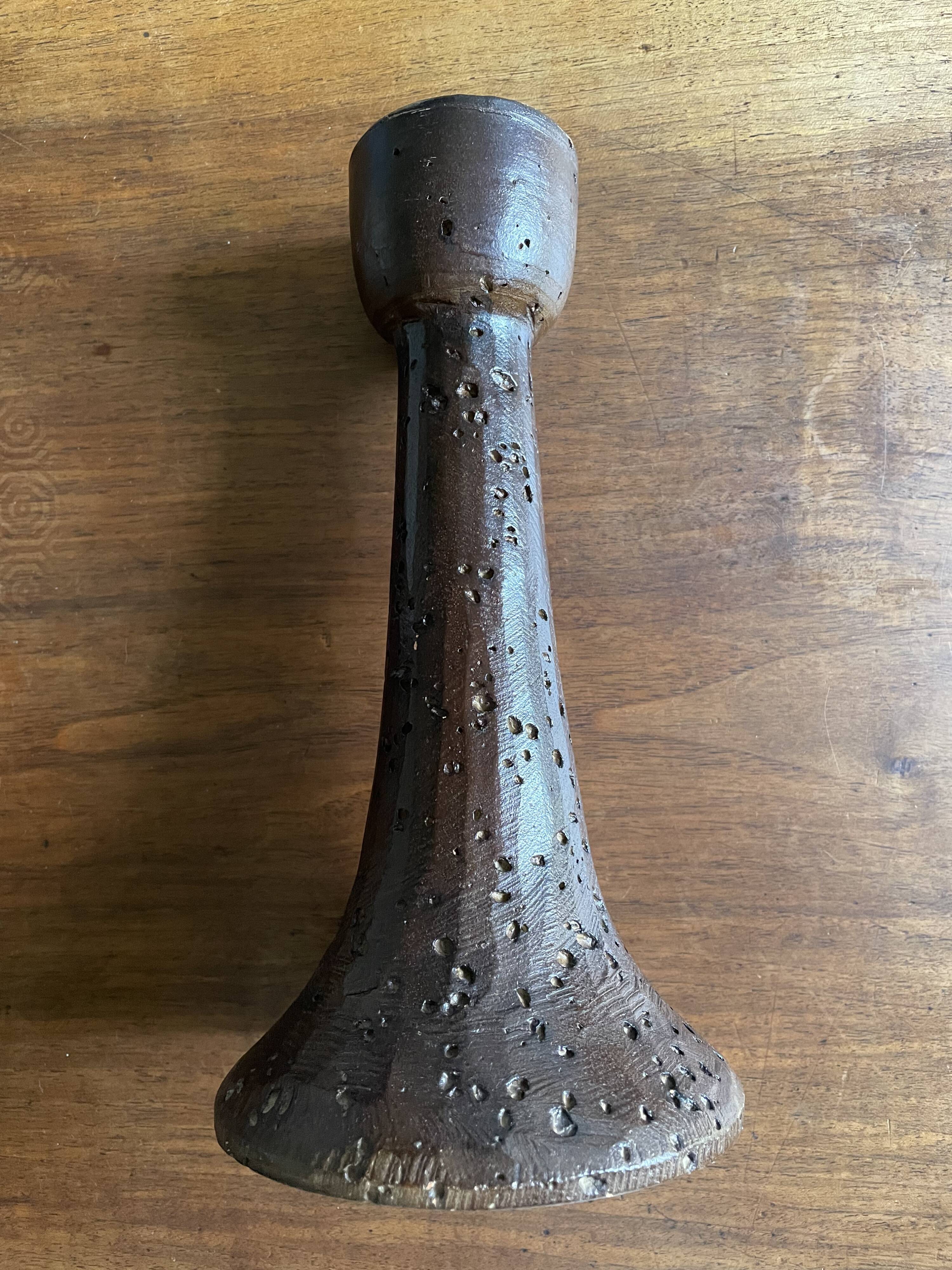 Brown enamelled terracotta candle holder