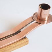 Pair of oak and copper bronze candlesticks