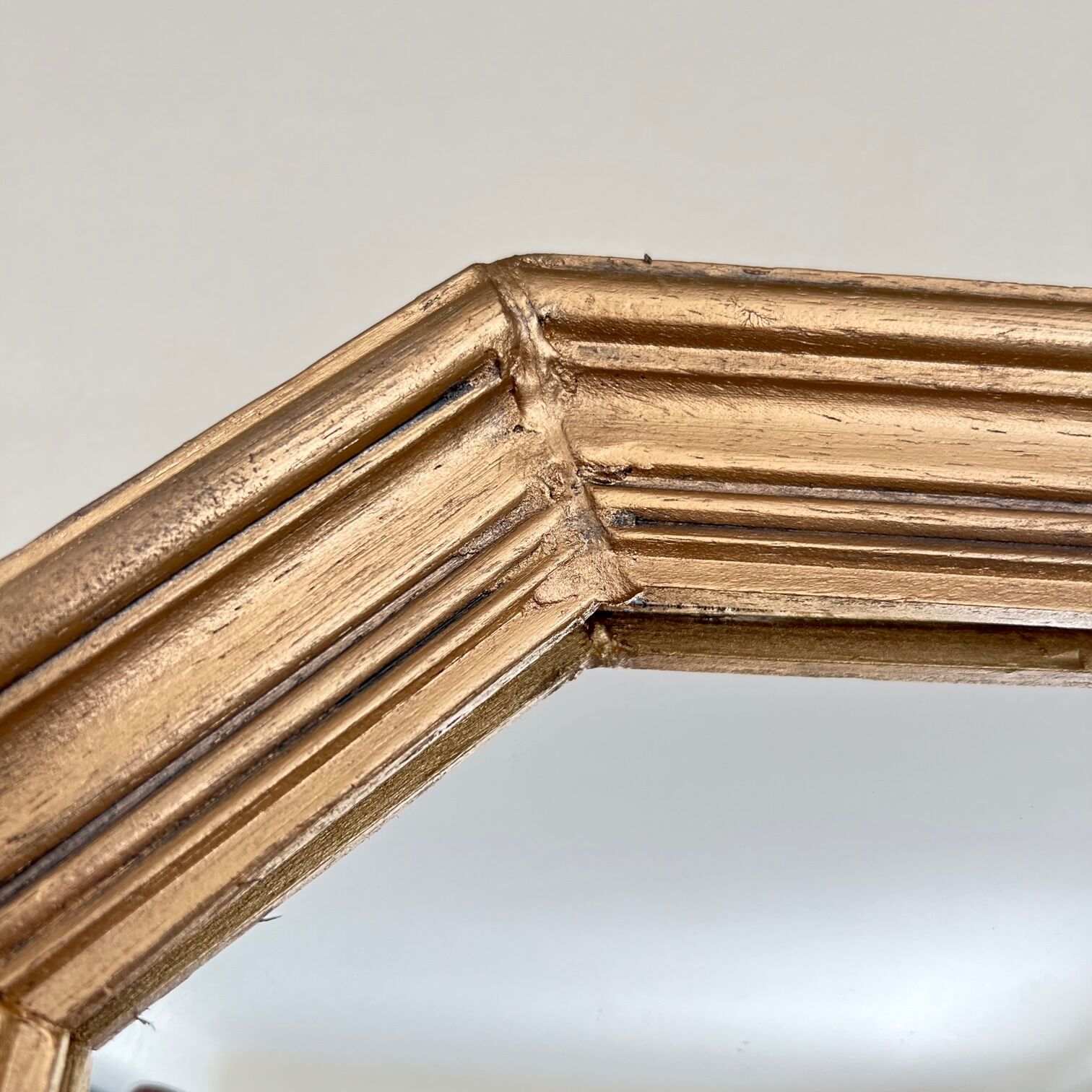 Octagonal golden mirror