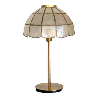 Lamp with an antique mother-of-pearl shade set and a golden foot