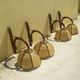 Four vintage rattan wall lamps