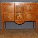 Louis XVI style chest of drawers with music attributes