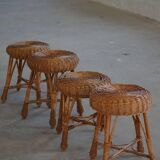 A set of 4 vintage Scandinavian rattan stools, in the style of Tony Paul, from the 1960s.