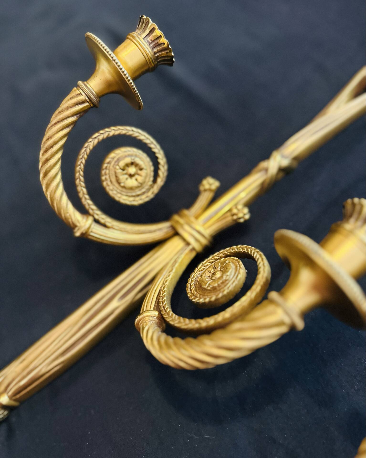 Pair of gilded bronze wall sconces in the Louis XVI style. 20th century.
