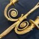 Pair of gilded bronze wall sconces in the Louis XVI style. 20th century.