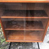 Library showcase with sliding glass doors 60s