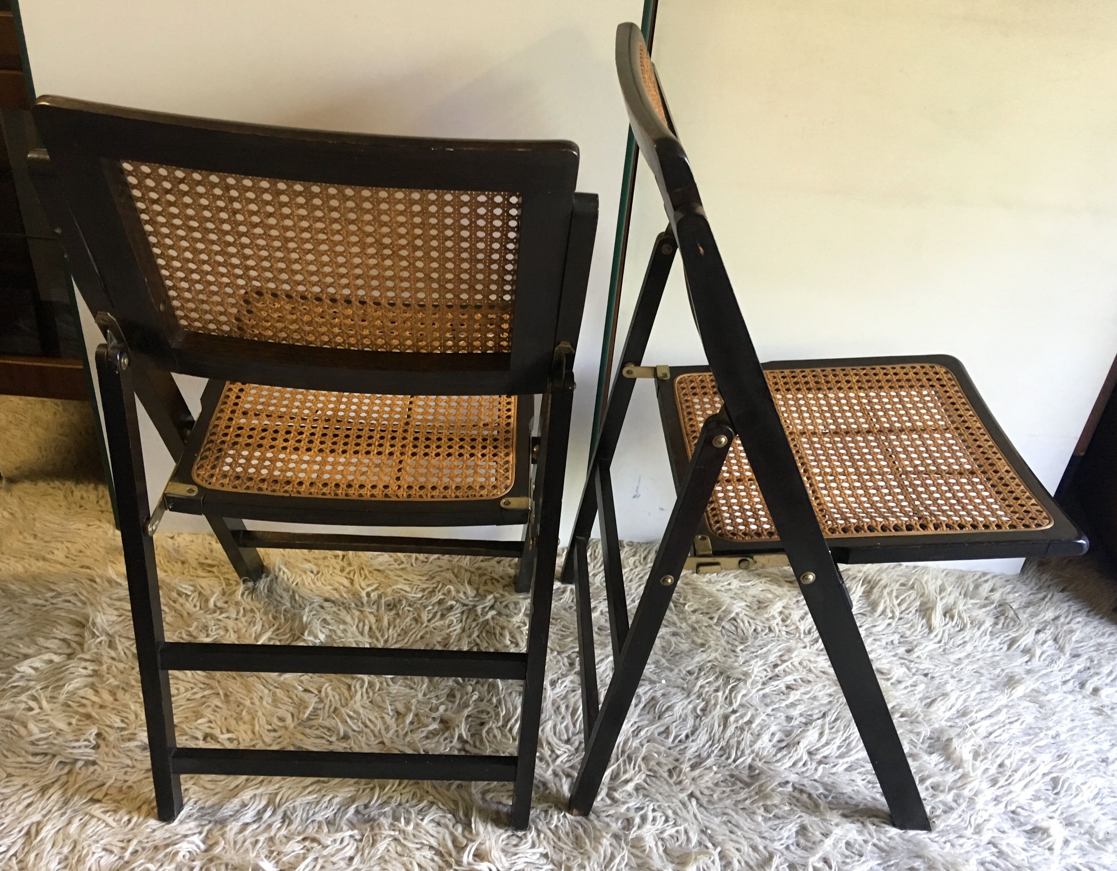 Four folding wooden and canning chairs - 70s