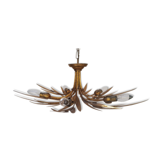 Golden metal chandeliers leaf decorations