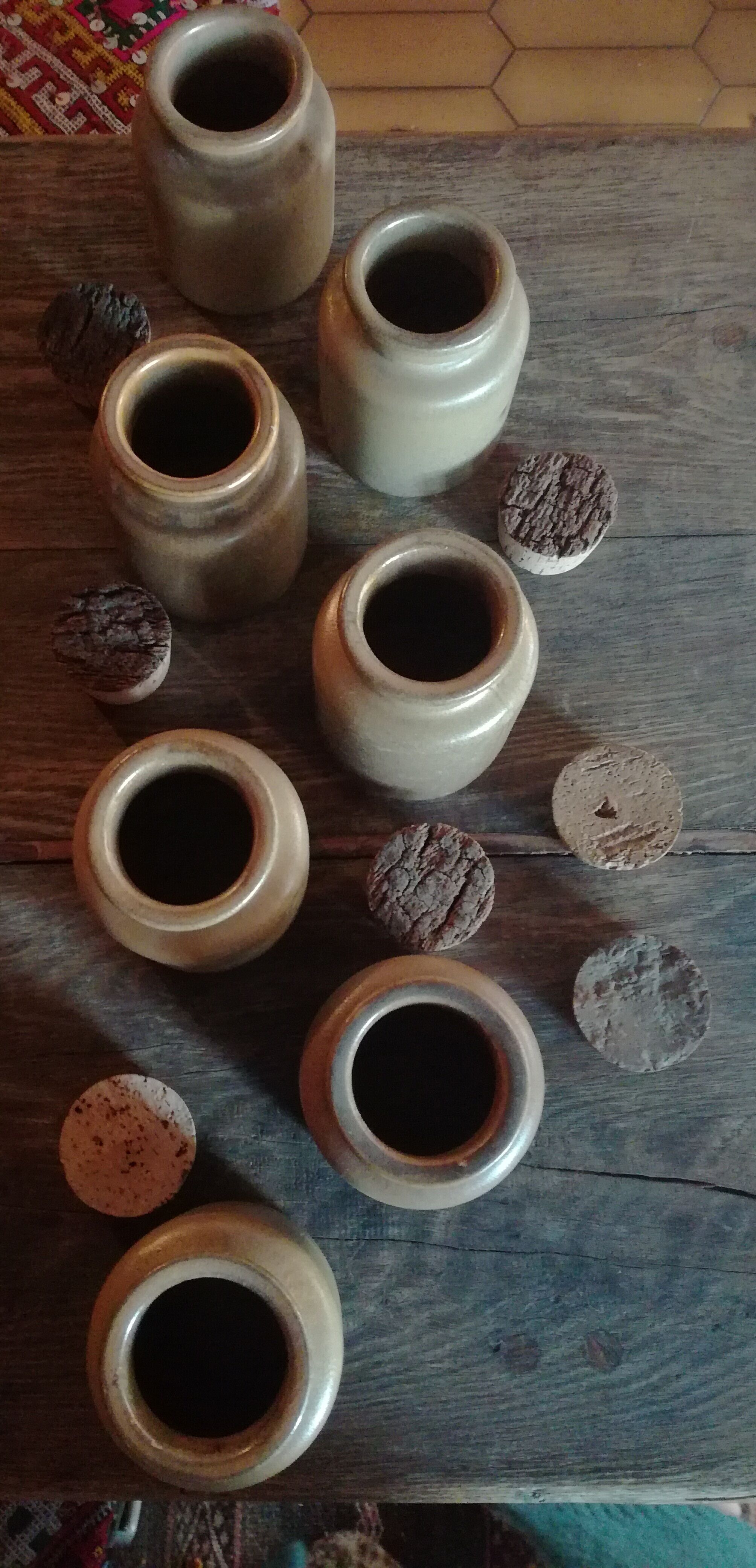 Lot of seven sandstone spice pots