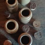 Lot of seven sandstone spice pots