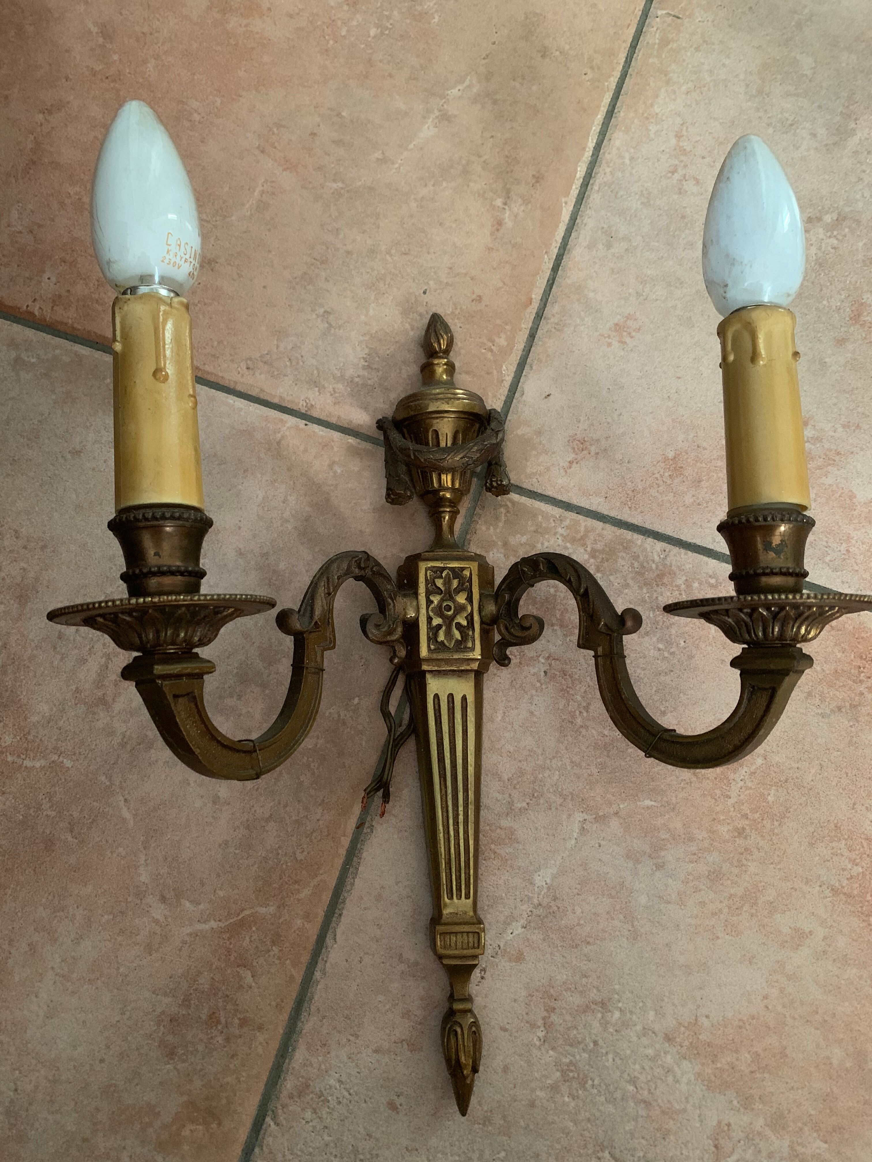 Double brass sconces