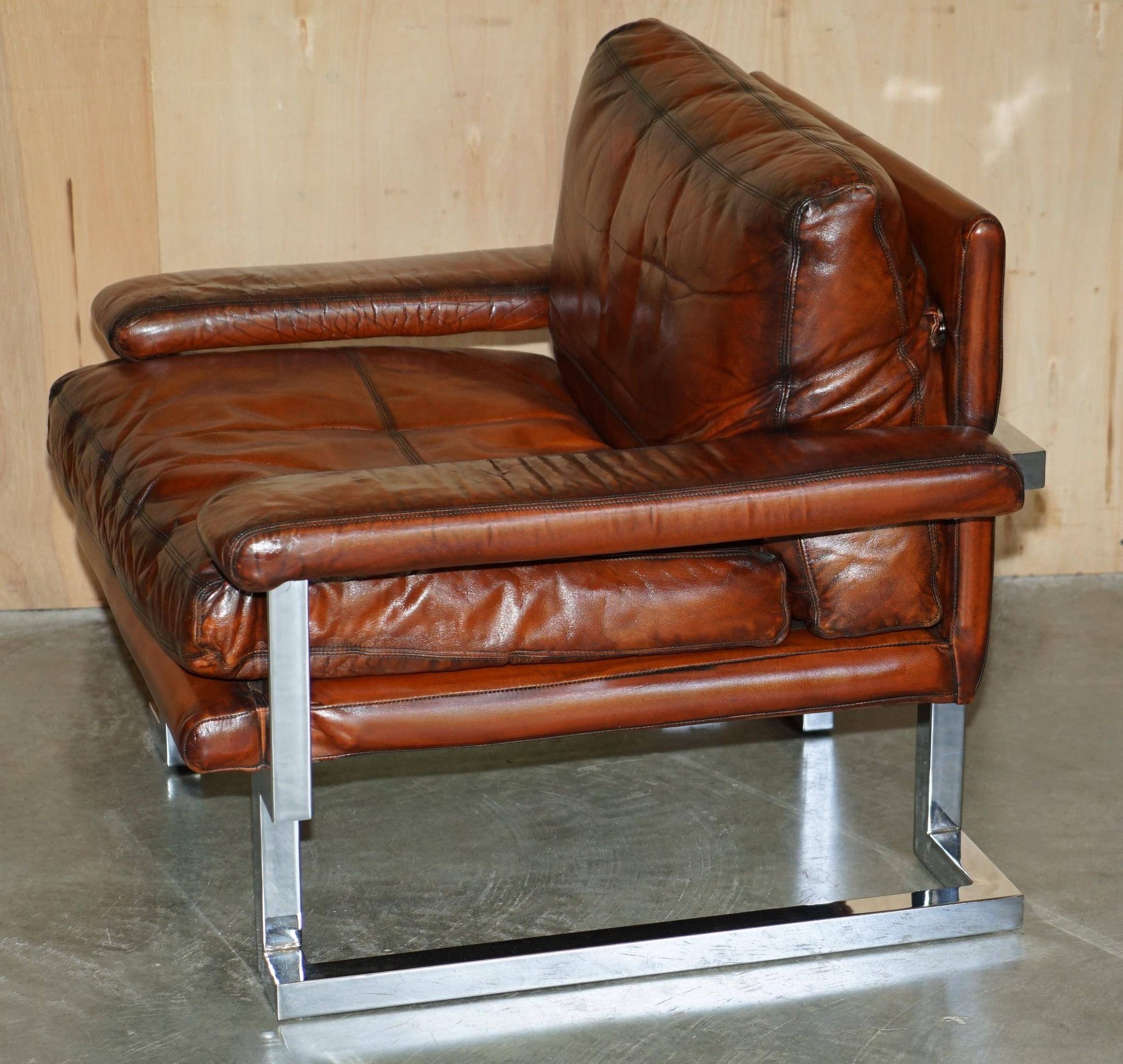 Restored suite Tim Bates for Pieff Mandarin leather chrome hardwood.