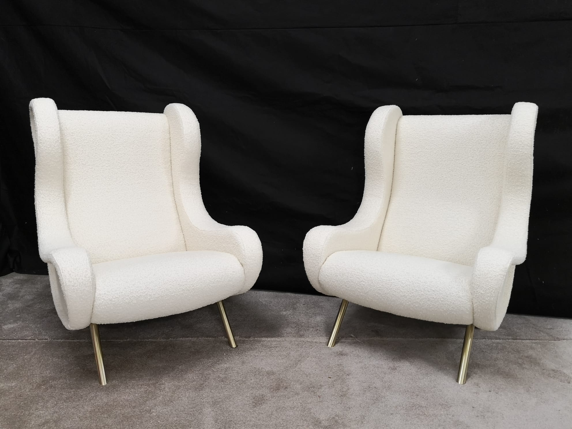 Pair of white buckle chairs