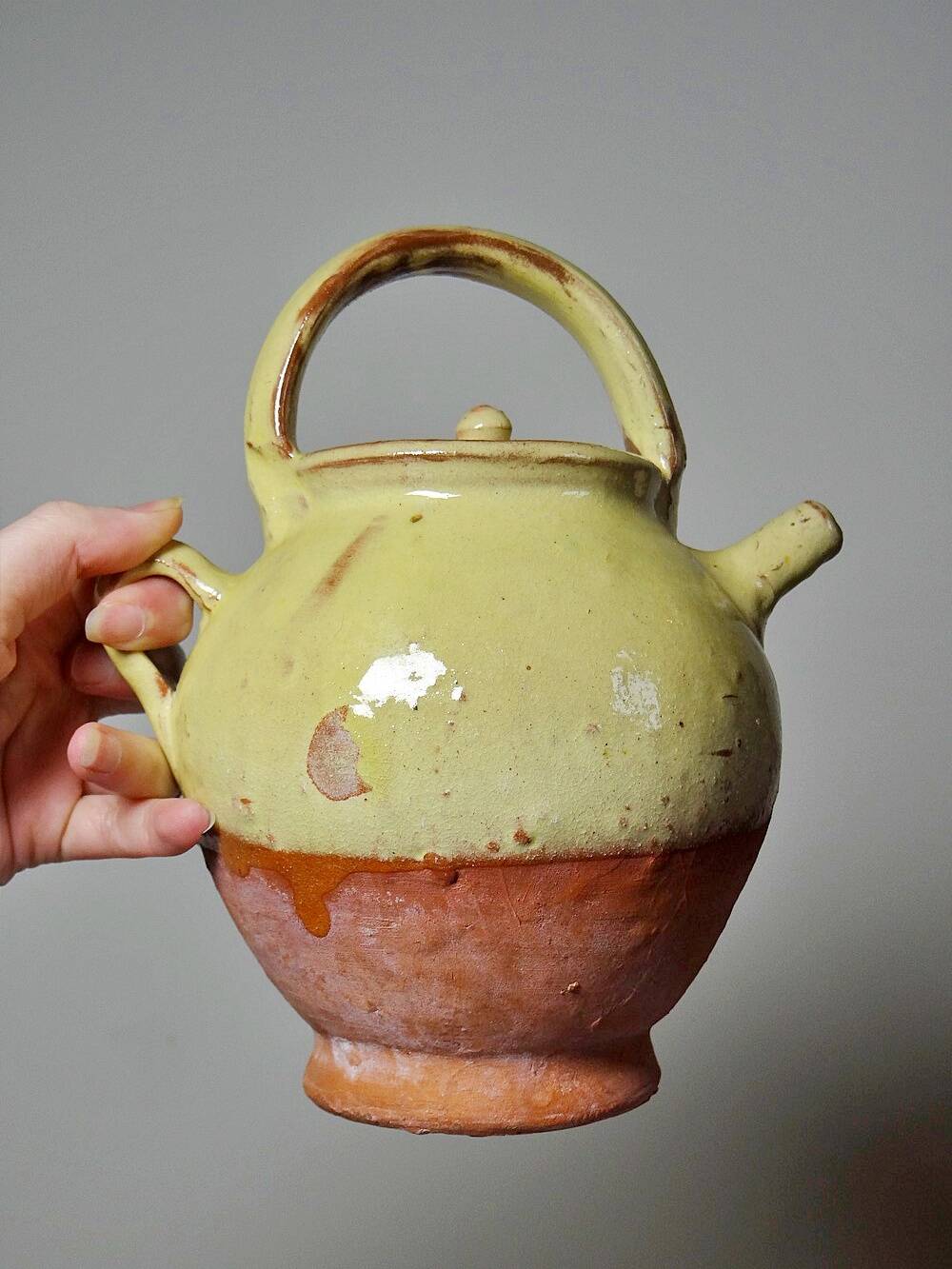 Small vintage pale yellow enamelled terracotta goat jug