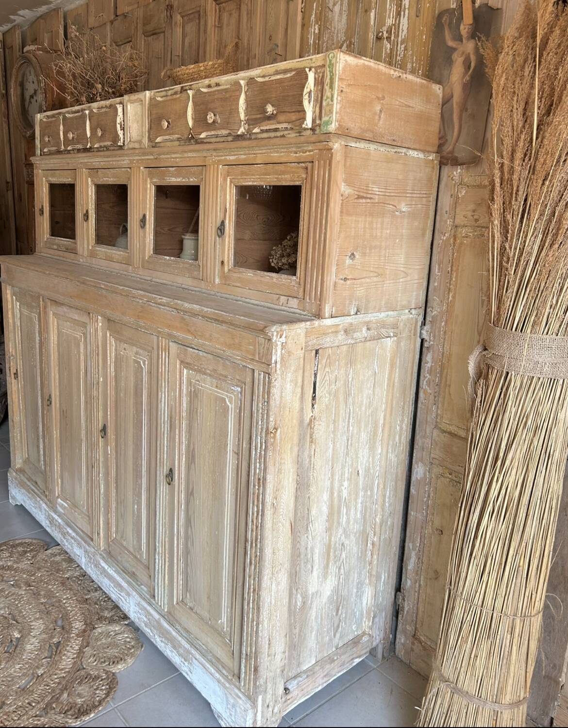 Old wooden grocery store cabinet, display cases and drawers