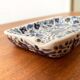 Vintage handmade blue ceramic ashtray with deer and flower ornament from Rodos Ceramics.