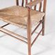 1930s small low spindle-back hearth chair / side chair with wicker seat, Arts & Craft Movement, Morris & Co for Liberty and Co, Stowaway London