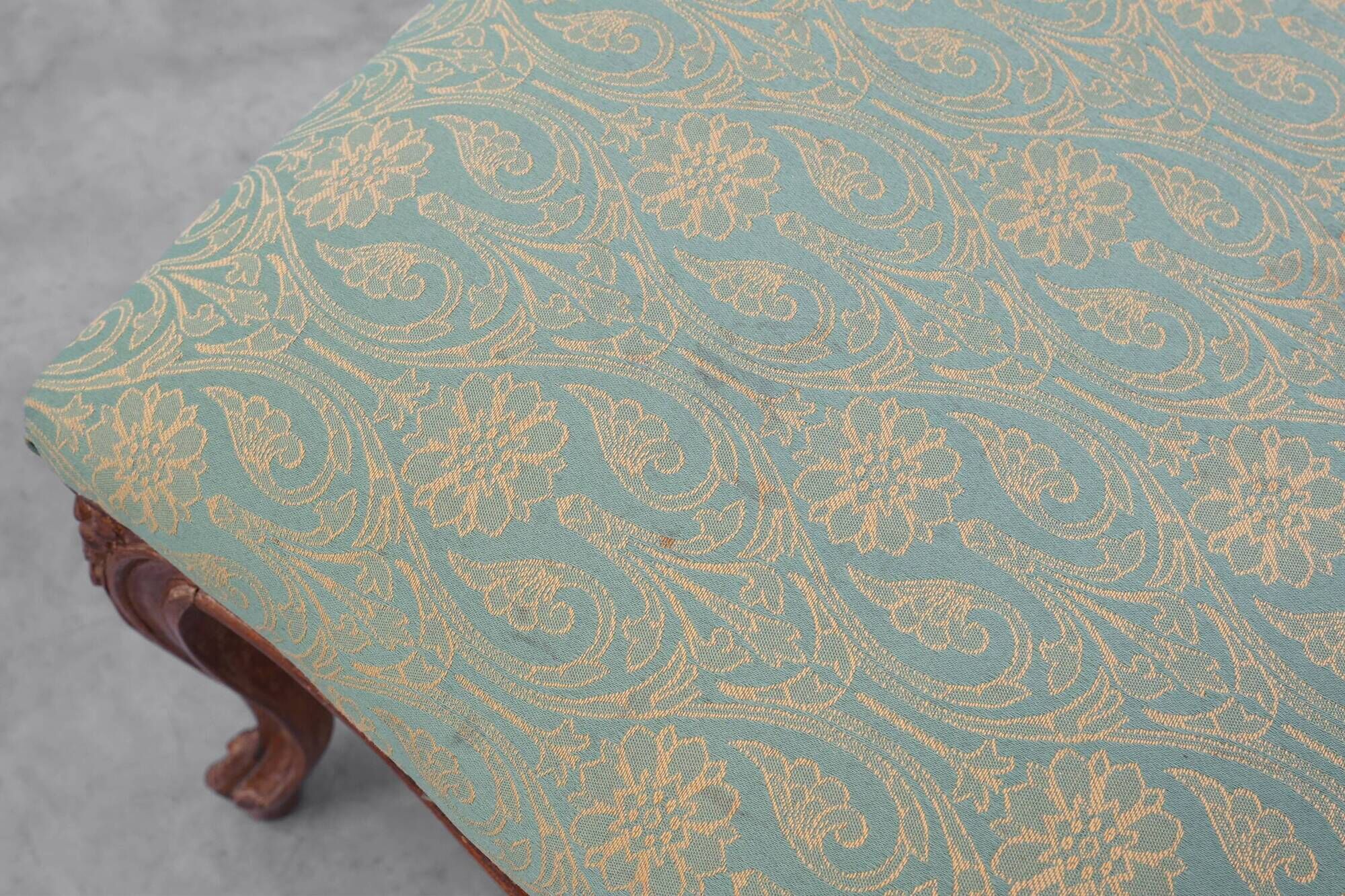 Louis XV stool with carved floral apron and original damask upholstery