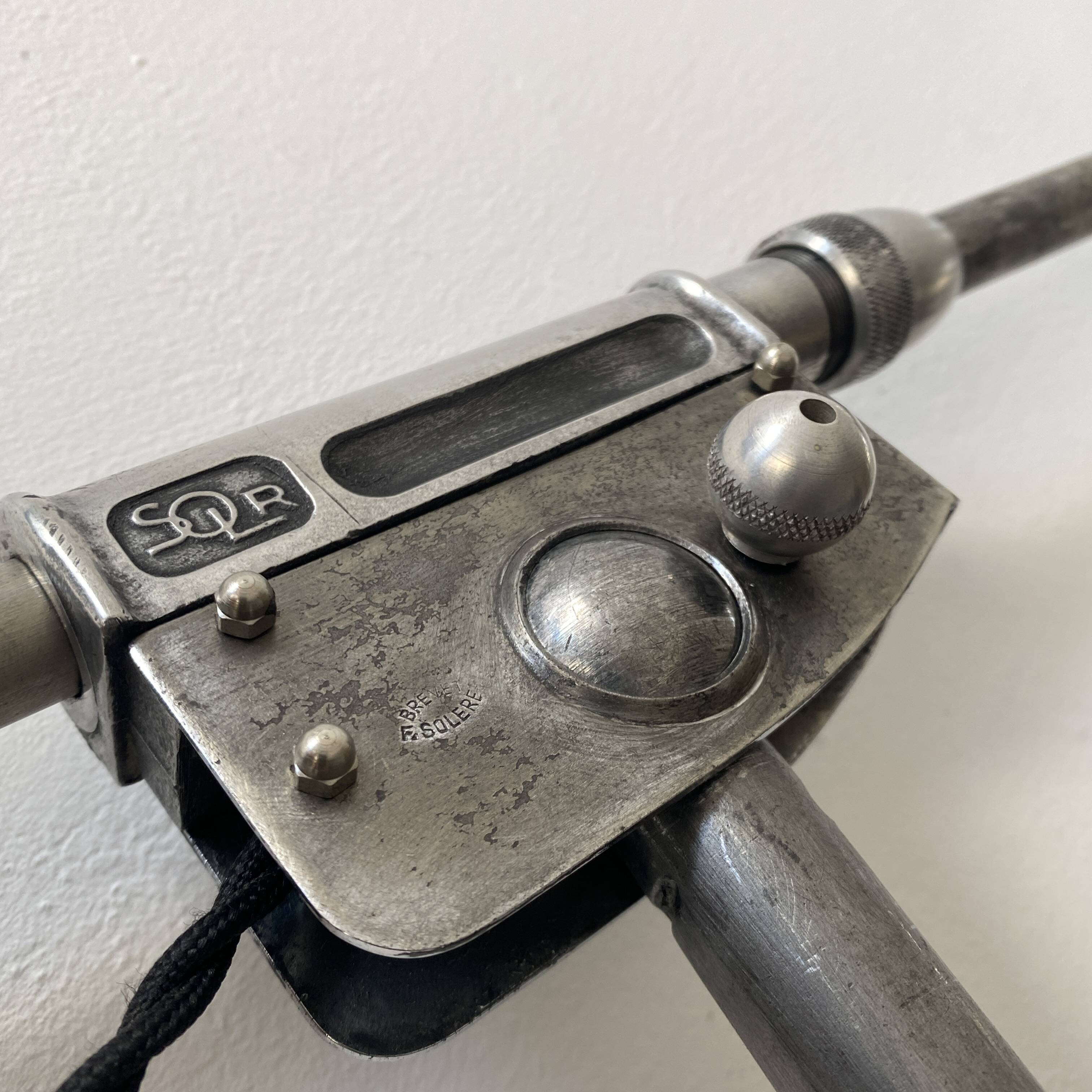 Old industrial wall light with counterweight.