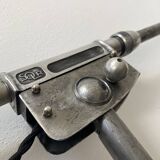 Old industrial wall light with counterweight.