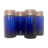 Suite of four bottles of ancient apothecary in blue breath glass