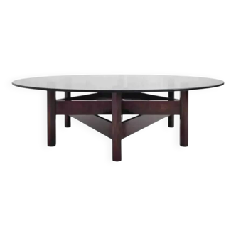 Wooden coffee table with round smoked glass top