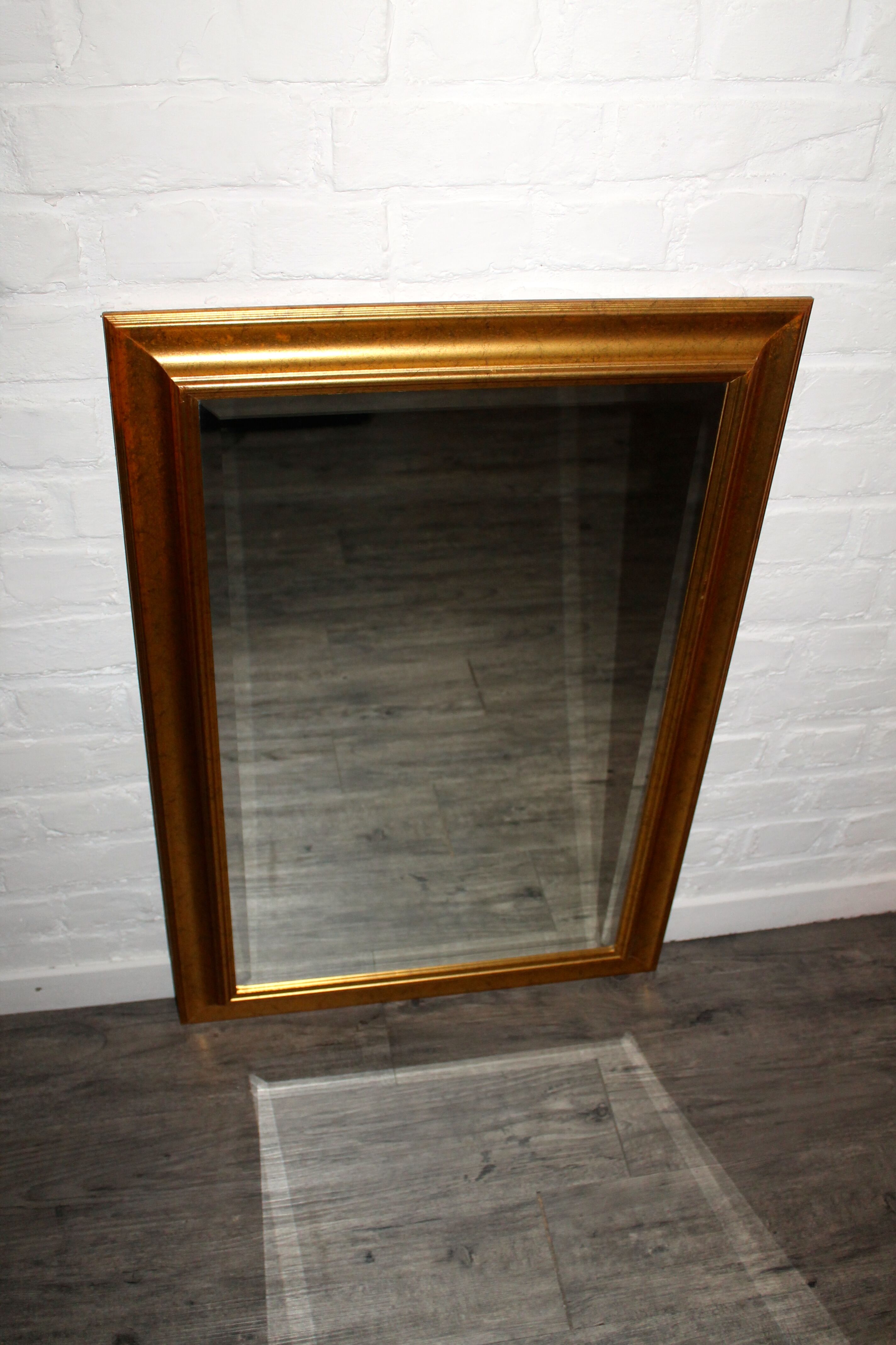 Miroir biseauté 90-58cm en bois doré