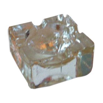 Square ashtray in cast transparent glass and 1970 vintage thick, sleek and design