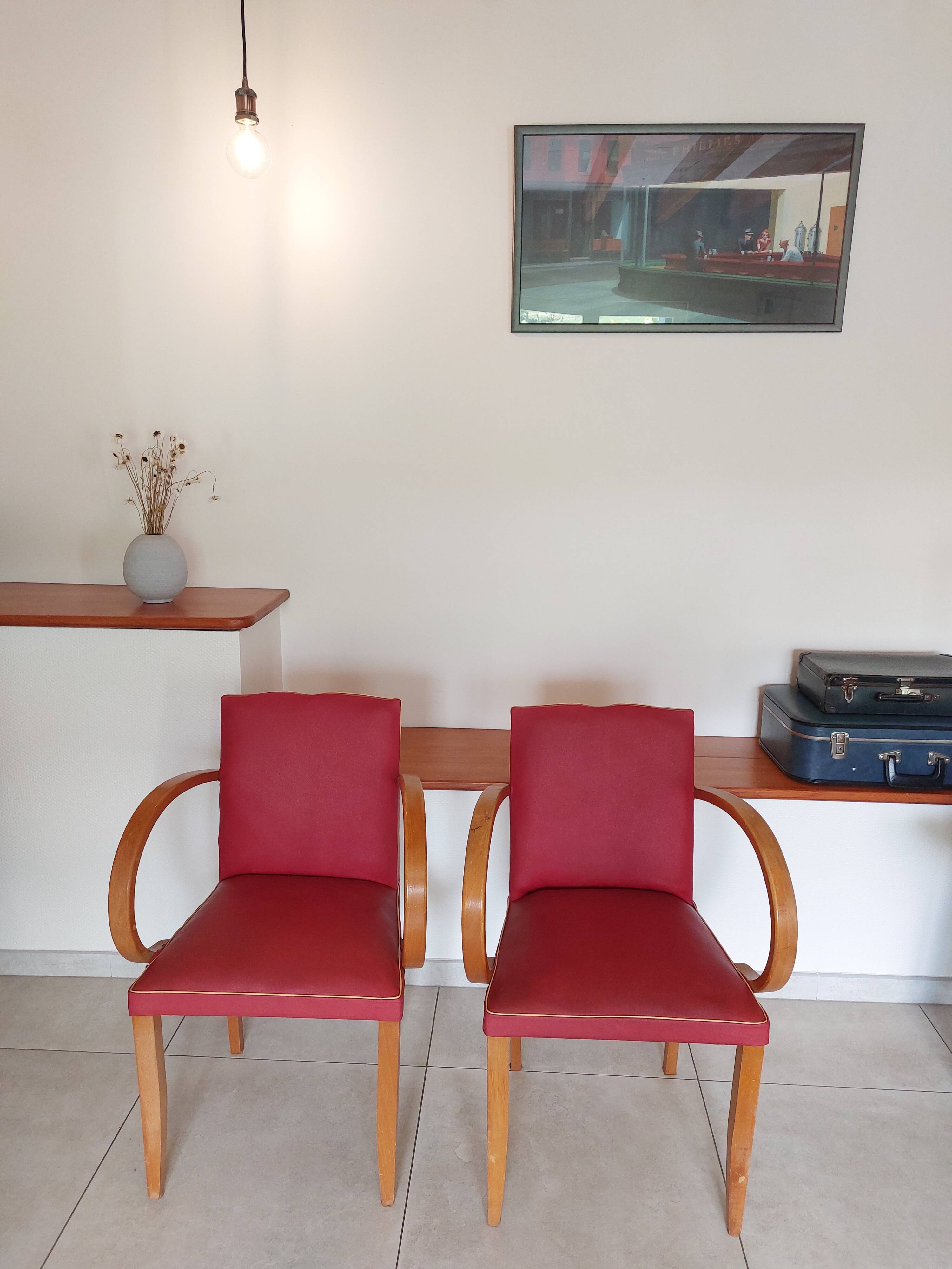 Pair of "moustache" bridge armchairs