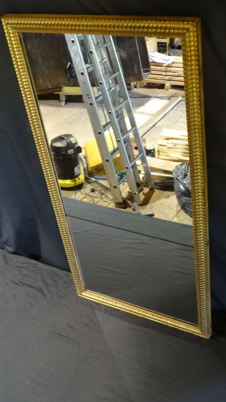 Gilded stucco mirror with gold leaf, H 152 cm