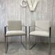 Pair of stainless steel armchairs from the 70s