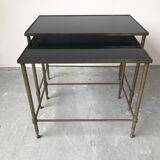 Pull-out tables in glass and brass