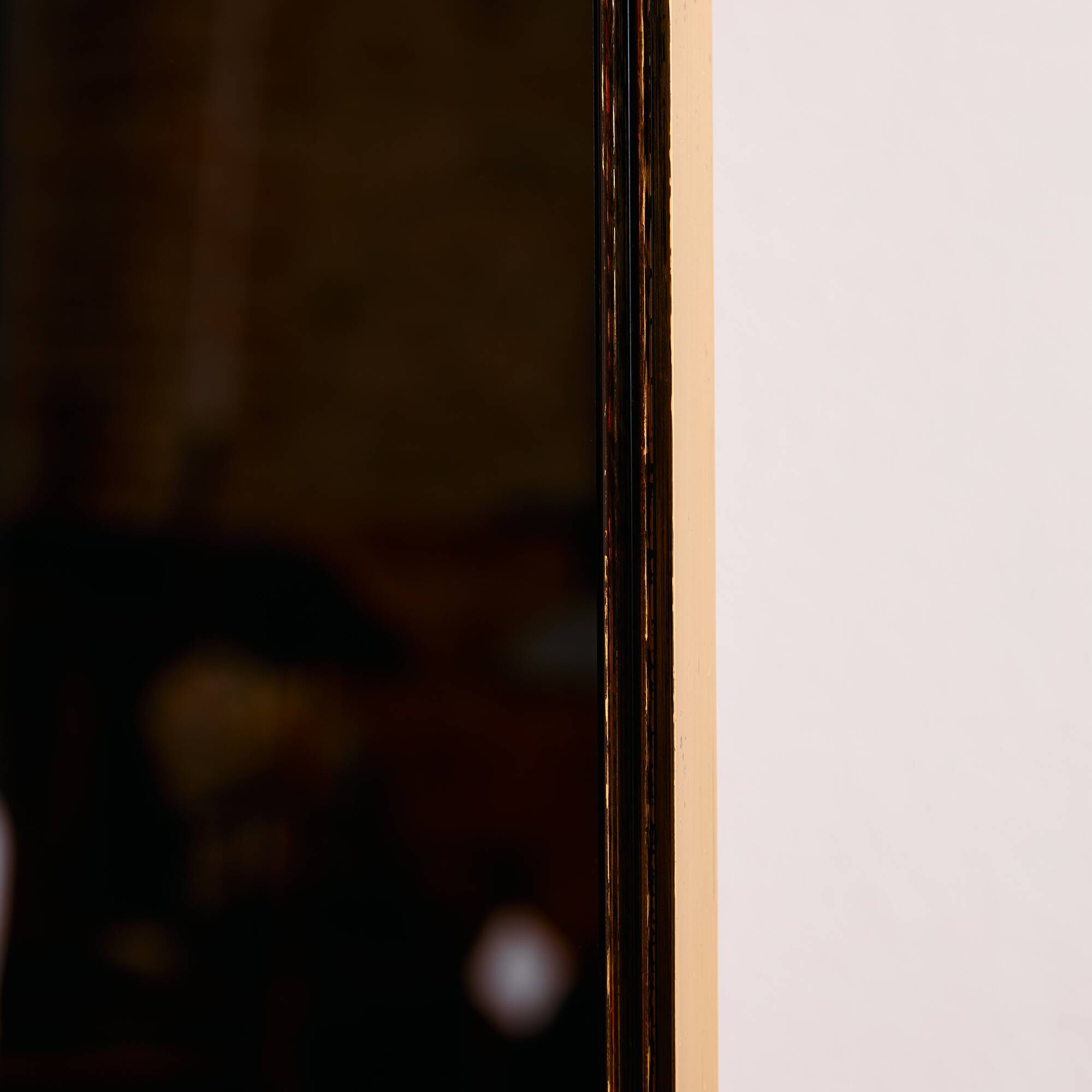 Metal and brass framed mirror