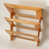Wall-mounted magazine rack in varnished plywood, 80s/90s