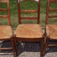 17 old straw chairs