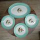Lot 1 large oval dish and 3 bird plates Green background