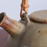 Sandstone teapot with rattan handle
