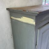 Blue patinated cap cabinet