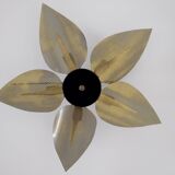 Ceiling light with perforated brass petals.
