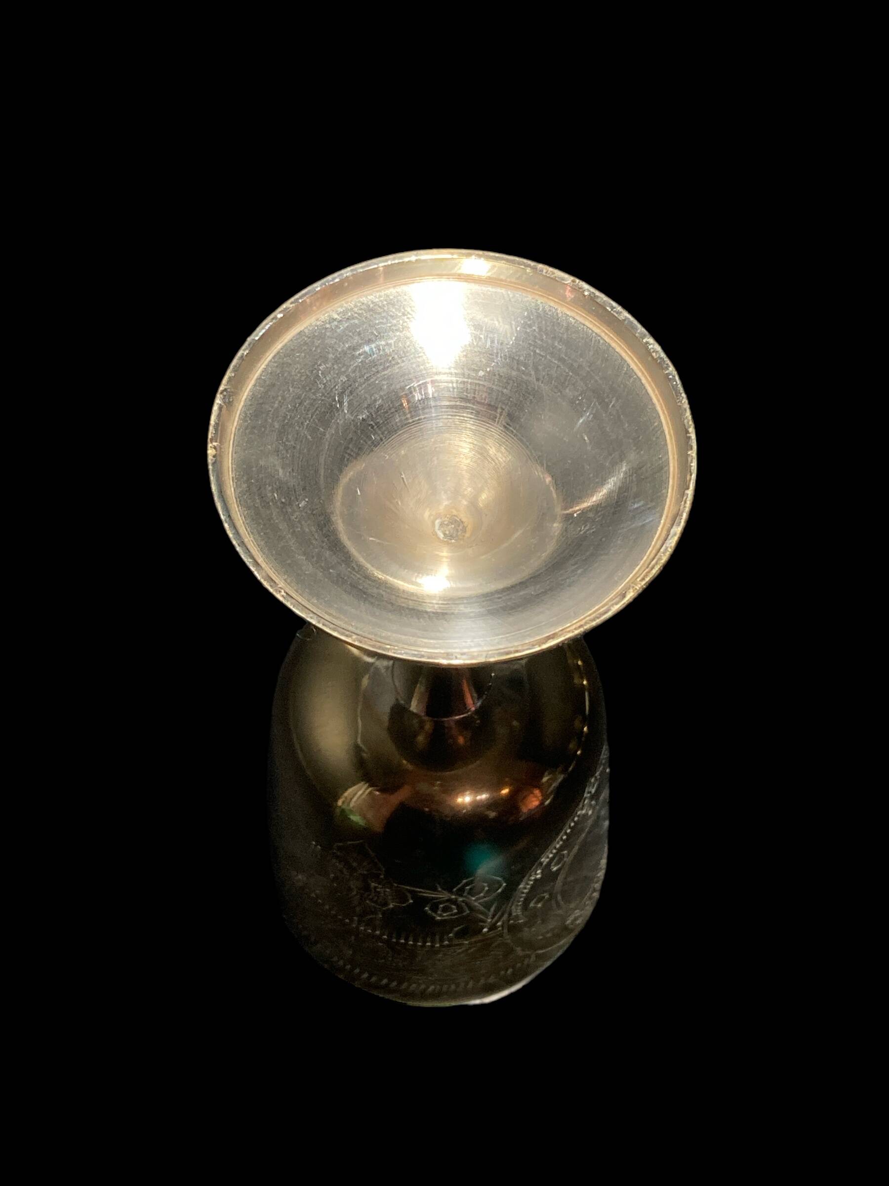 Set of six gold metal glasses