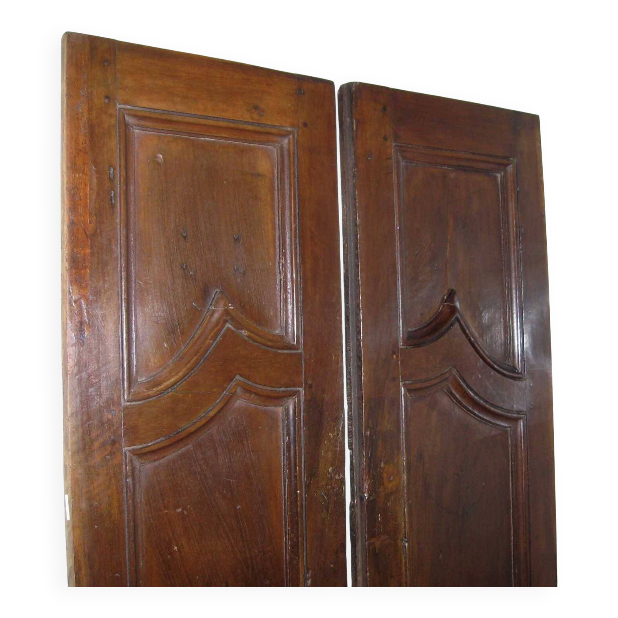 Pair of antique solid walnut doors from the 18th century.