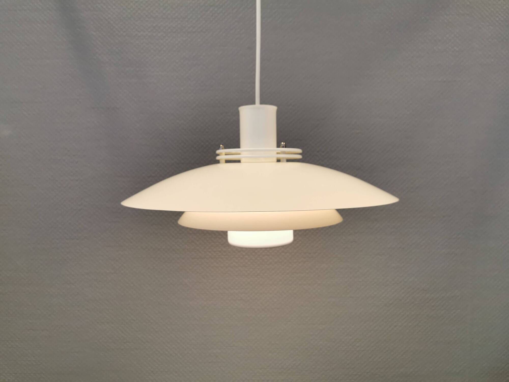 FormLight hanging lamp with multiple layers of shades, a Danish quality product from the 80s.