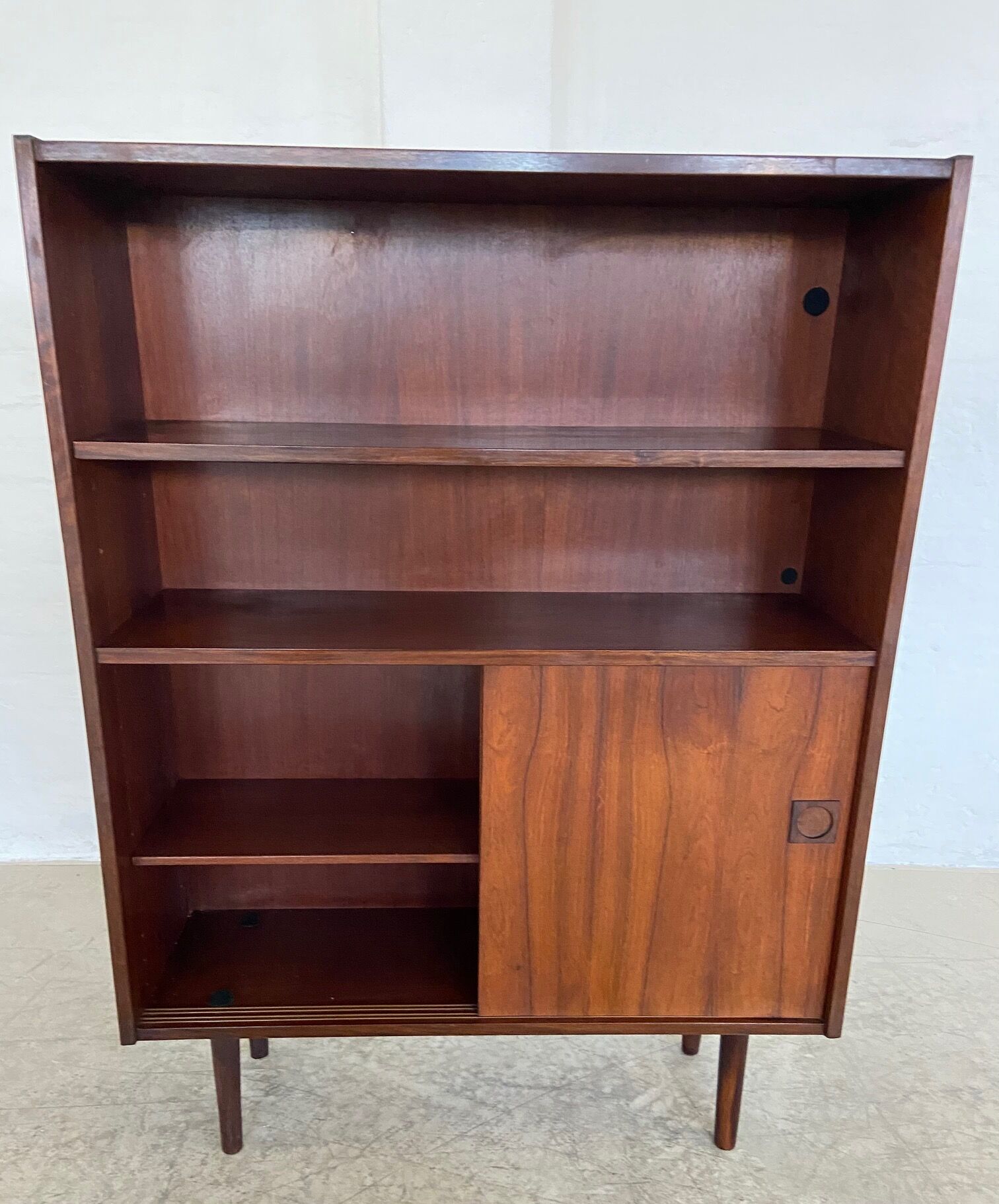 Danish retro vintage library in rosewood with sliding doors from the 1960s.