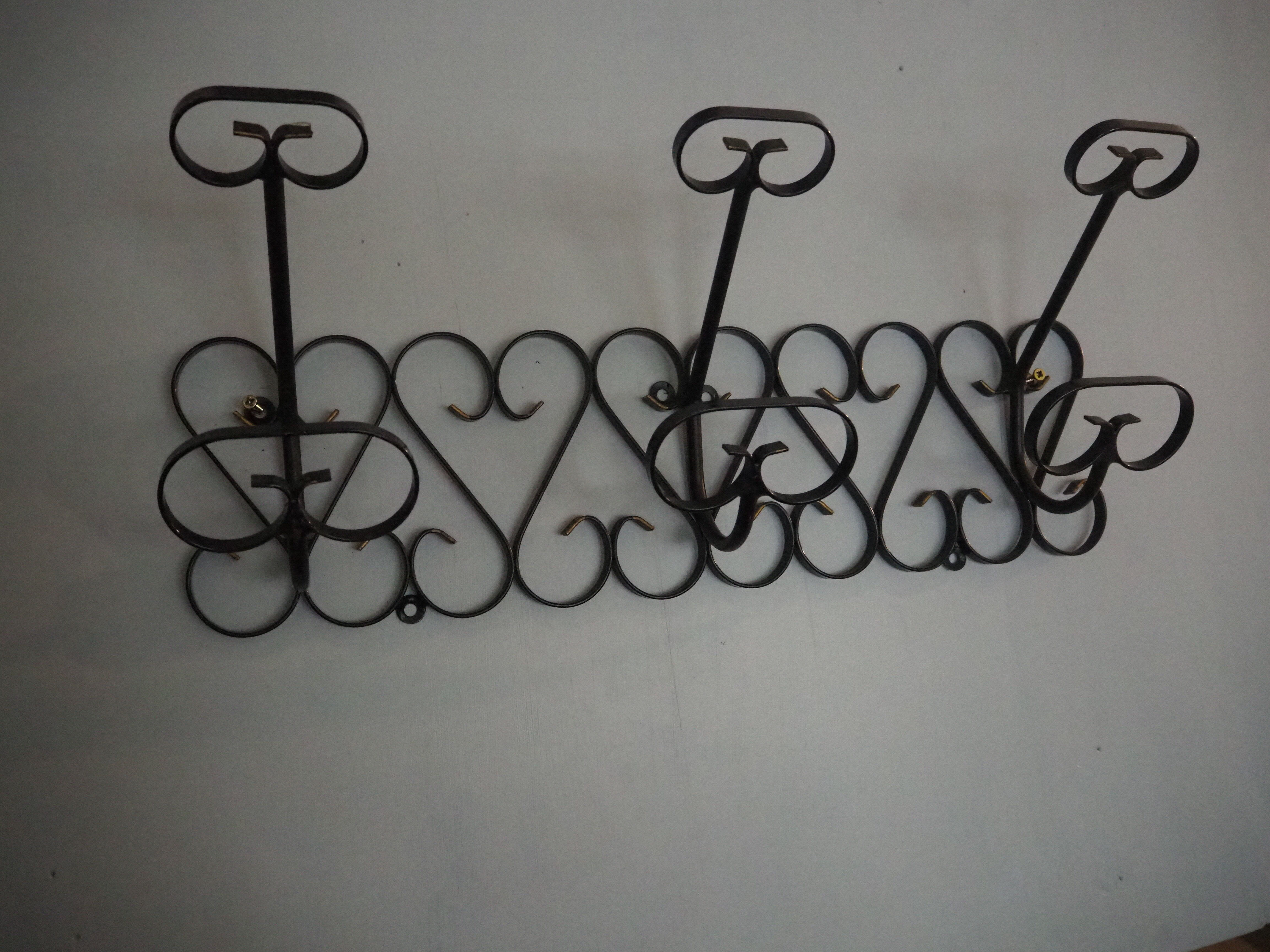 1970s wrought-iron wall coat holder