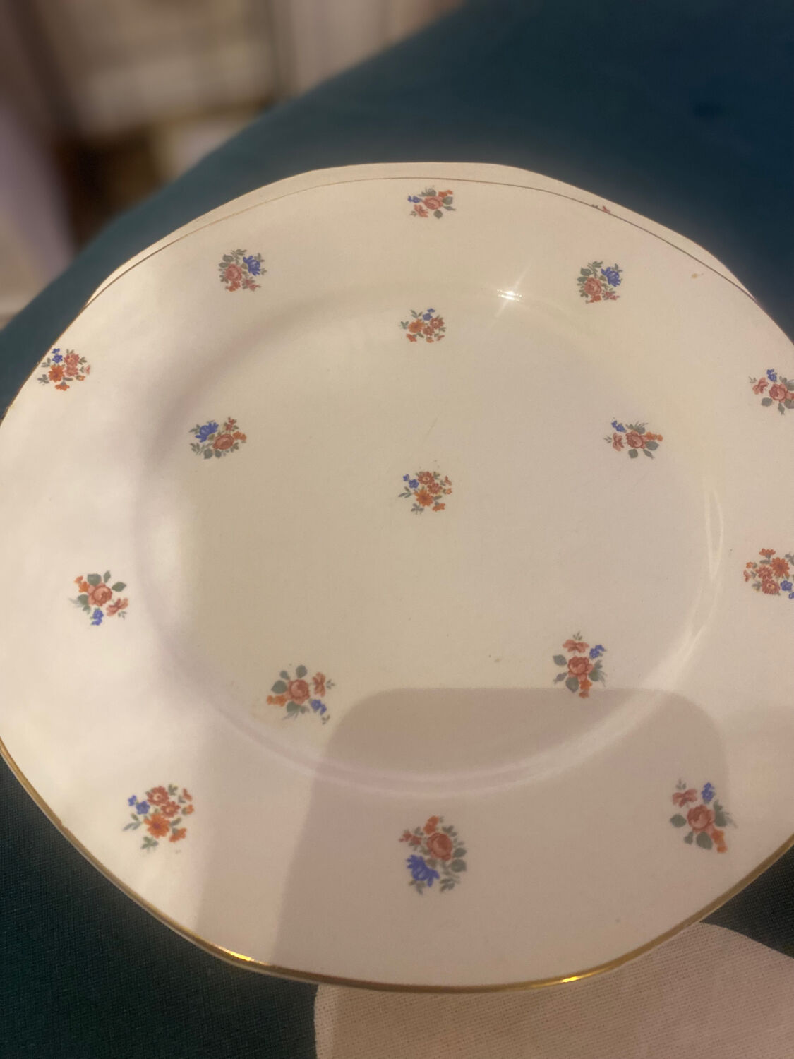 Dessert plate and porcelain dish with a multicoloured floral pattern vintage.