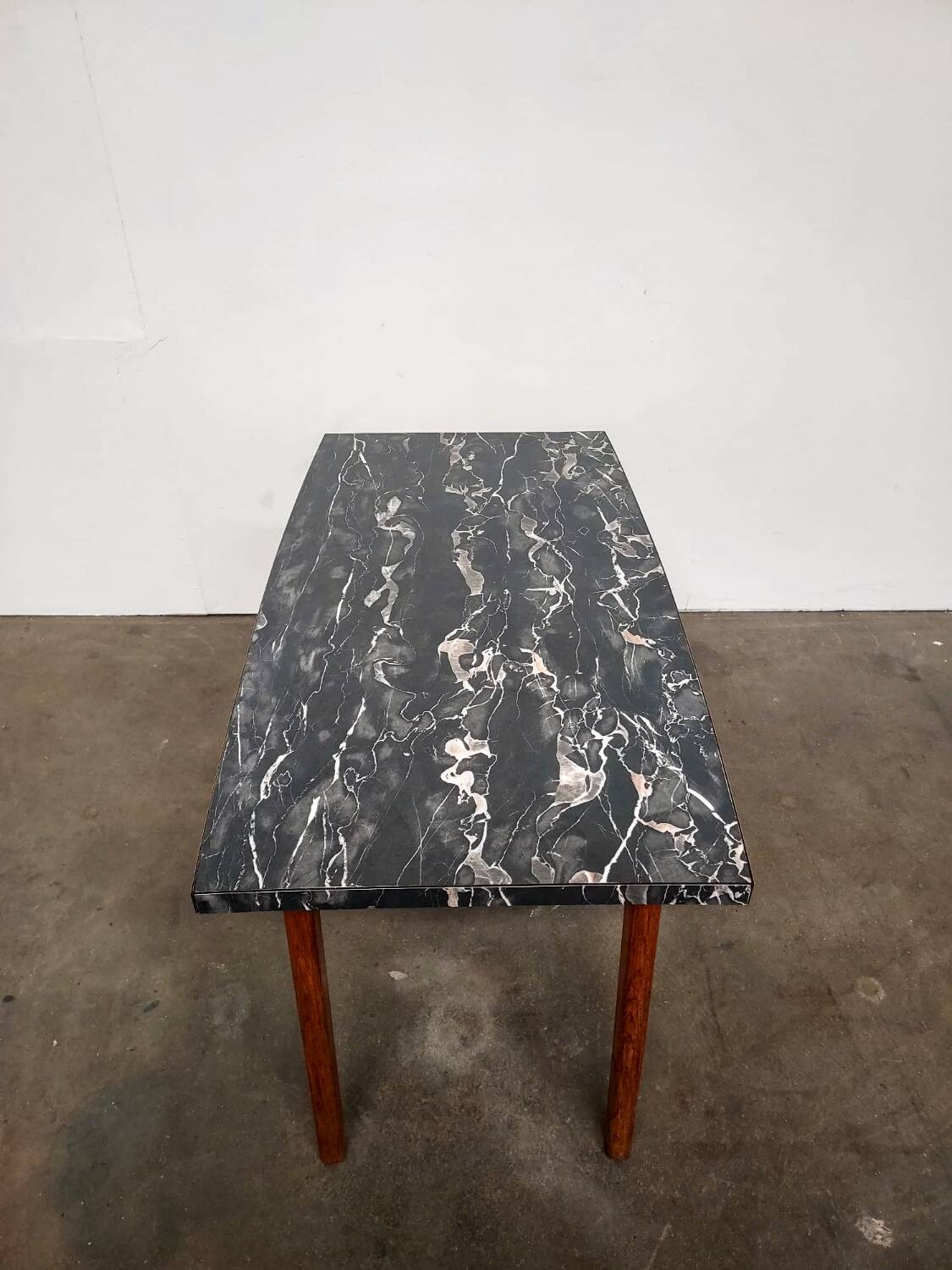 Marble effect Formica coffee table - flared legs