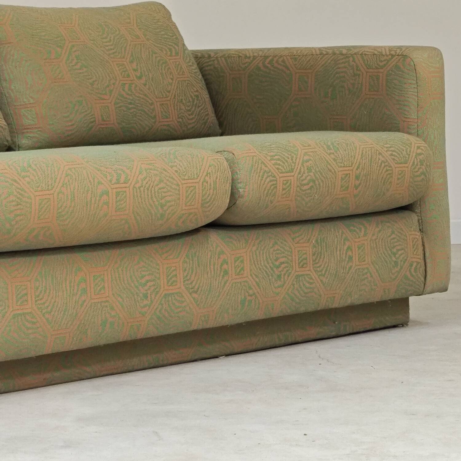 Pierre Frey modernist bench in green and gold patterned fabric