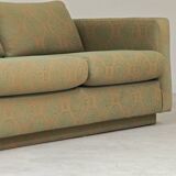 Pierre Frey modernist bench in green and gold patterned fabric