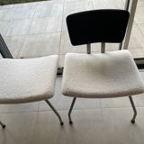 Armchair and footrest in boucle wool.