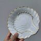 Pair of white and gold porcelain shell-shaped bowls